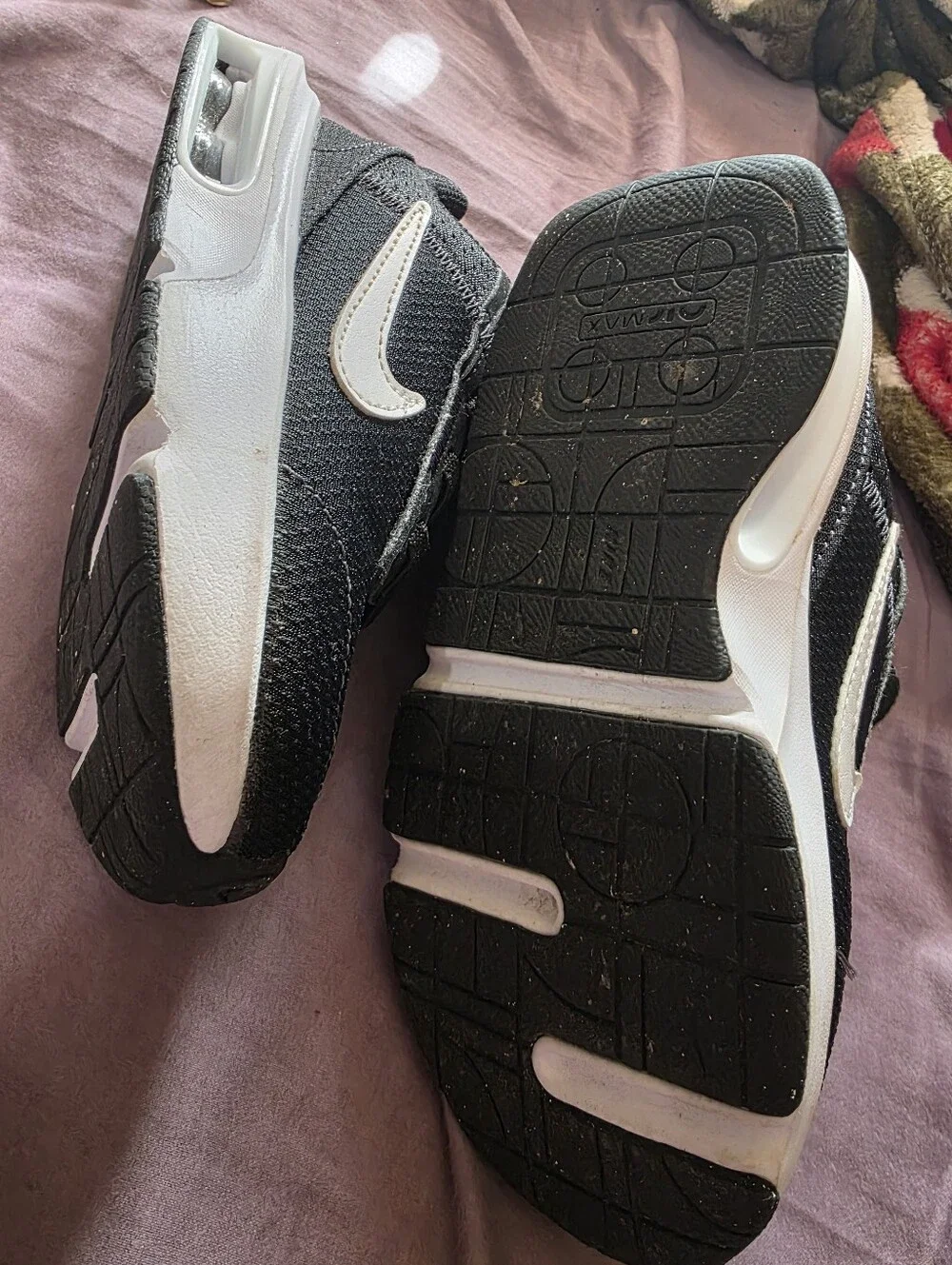 Nike Kids Black Sneakers with White Sole and Small Pink Swoosh